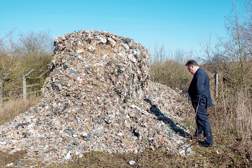 David Lloyd inspecting a huge flytipping incident in Herts earlier this year