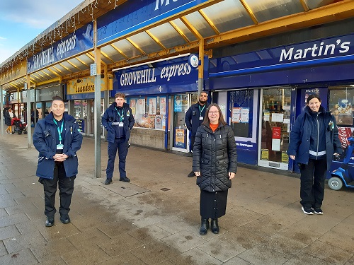 Cllr Banks and enforcement officers at Grovehill shops