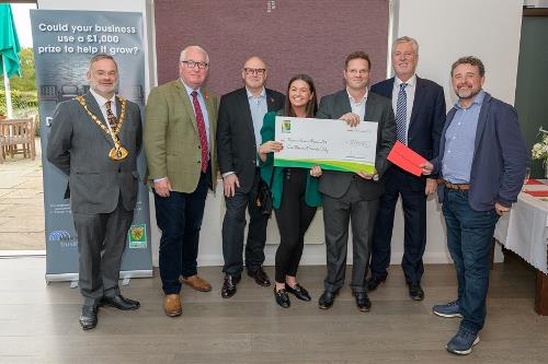 Jane and Nick Brand receive their cheque from the Dacorum's Den panel