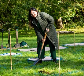 Cllr Simy Dhyani digging at site of new sensory garden in Highfield
