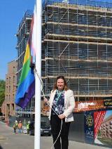 Chief Executive Claire Hamilton raises Pride flag outide the Forum in Hemel Hempstead